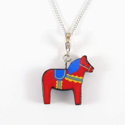 Red, Yellow, And Blue Dala Horse Pendant And..