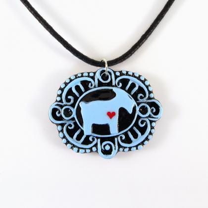 Blue Goat With Heart Cameo Pendant And Black Cord..