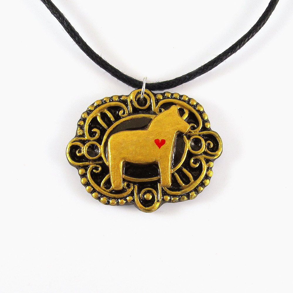 Gold Dala Horse Cameo Pendant And Black Cord Necklace