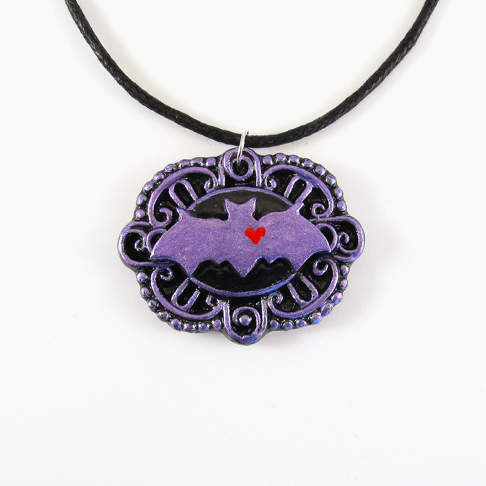 Metallic Purple Bat Cameo Pendant And Black Cord Necklace