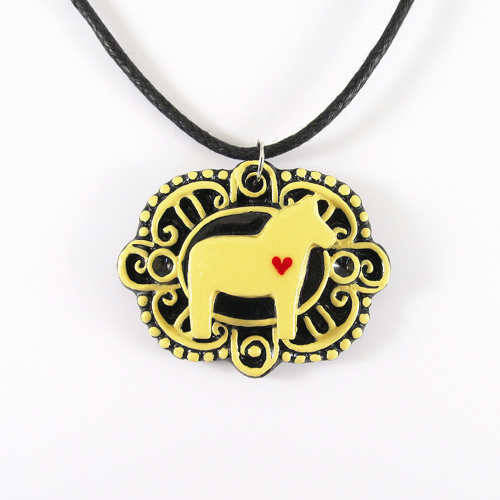 Yellow Dala Horse With Heart Cameo Pendant And Black Cord Necklace