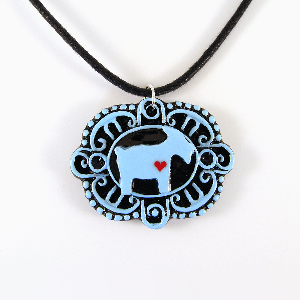 Blue Goat With Heart Cameo Pendant And Black Cord Necklace